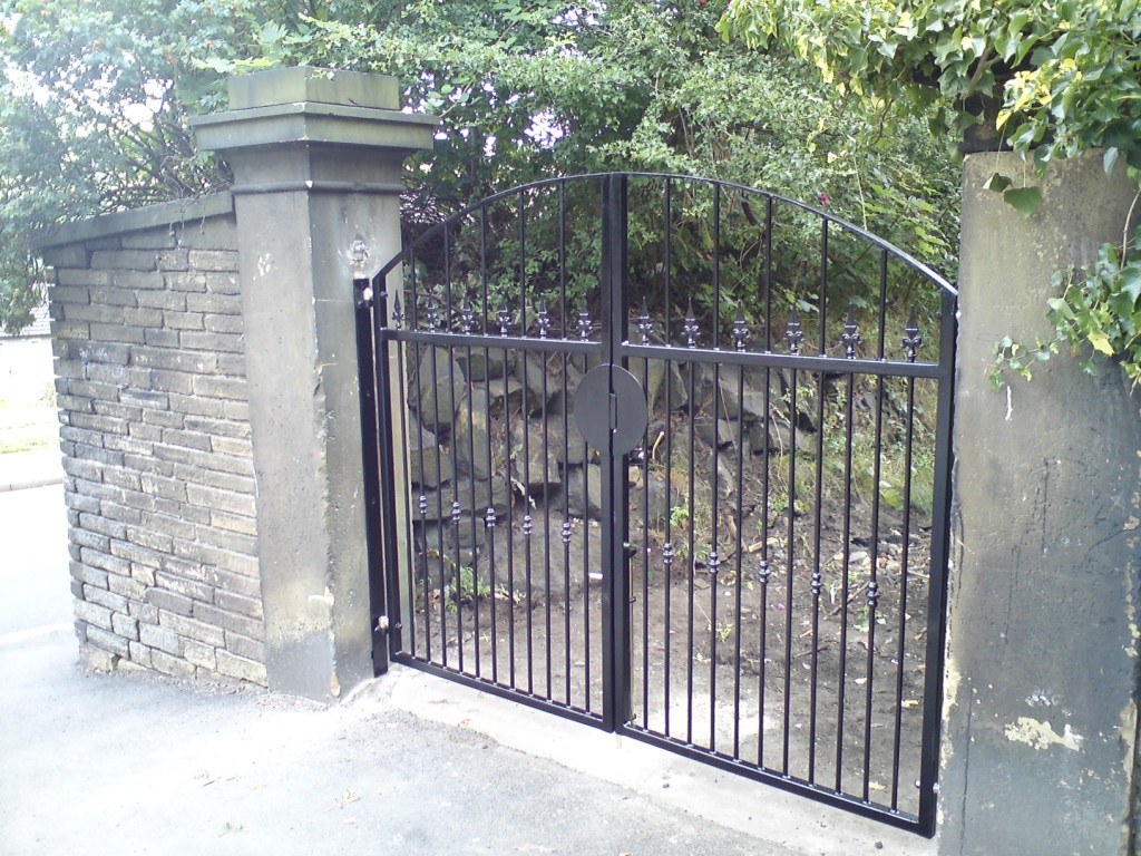 A pair of hinge gates, all manufactured in house then painted Black