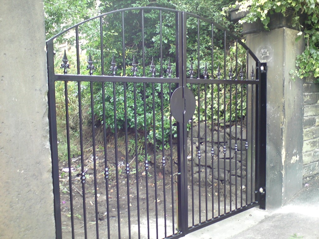 A pair of hinge gates, all manufactured in house then painted Black