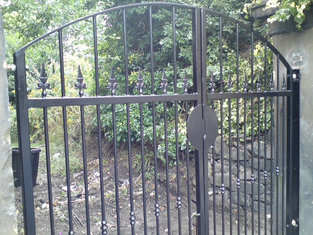 A pair of hinge gates, all manufactured in house then painted Black